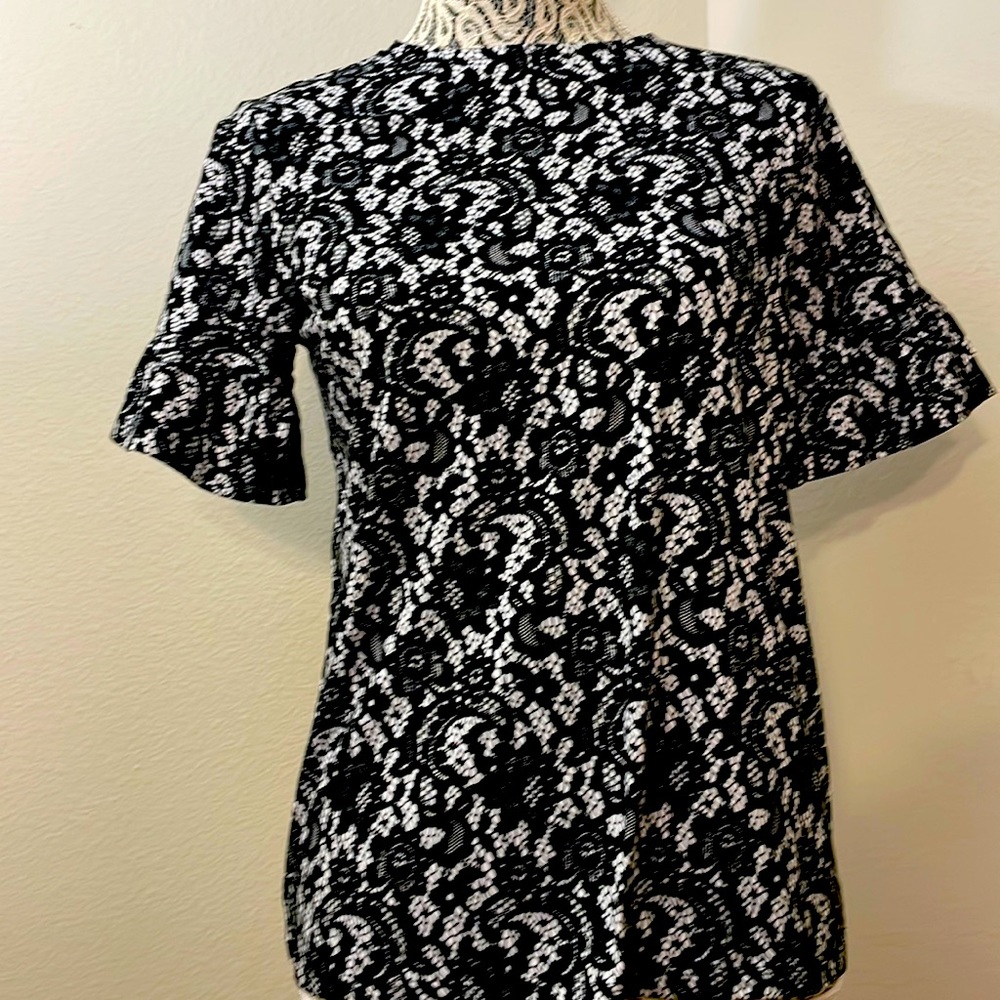 MICHAEL KORS black and white tee shirt.